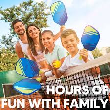family playing pickleball